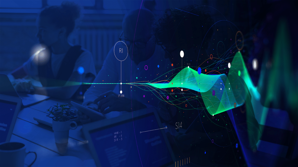 A futuristic image showing people working with laptops, overlaid with colorful data visualizations and metrics, on a blue background.